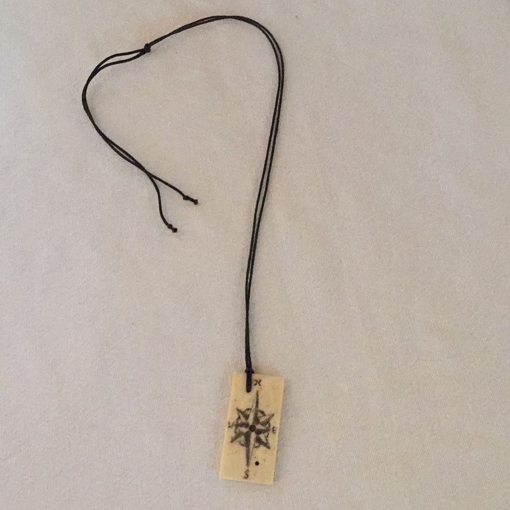 Artisan, reversible Compass Rose/ Domino necklace.